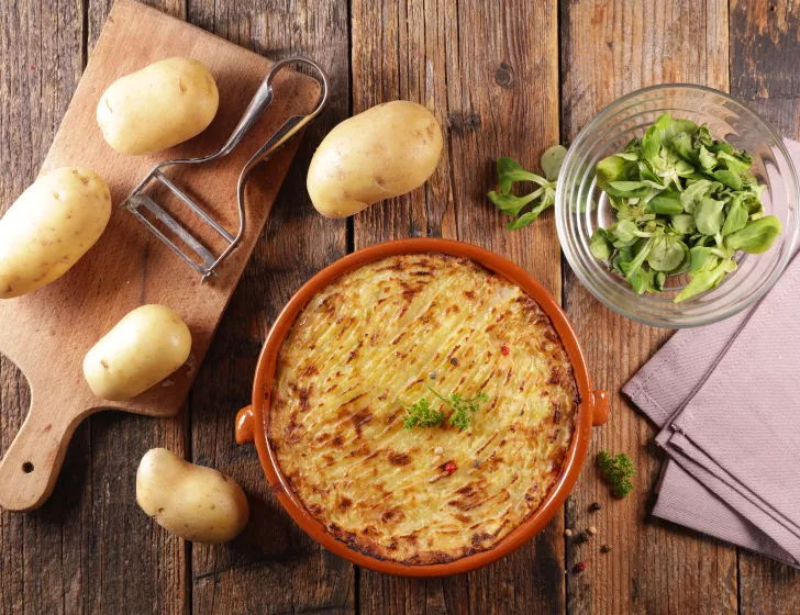 Parmentier d’effiloché de Jambonneau à la moutarde ancienne et chicons braisés.